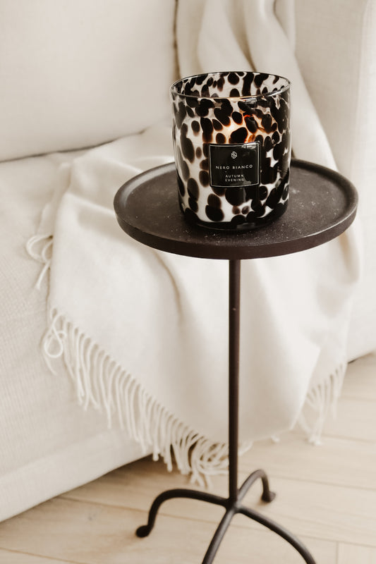 AUTUMN EVENING DUAL WICK CANDLE ON SMALL SIDE TABLE