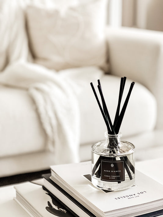 Signature Reed Diffuser cuban tobacco and oak styled in cosy living room