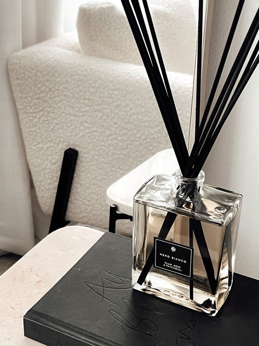 large rectangular reed diffuser styled in a neutral home