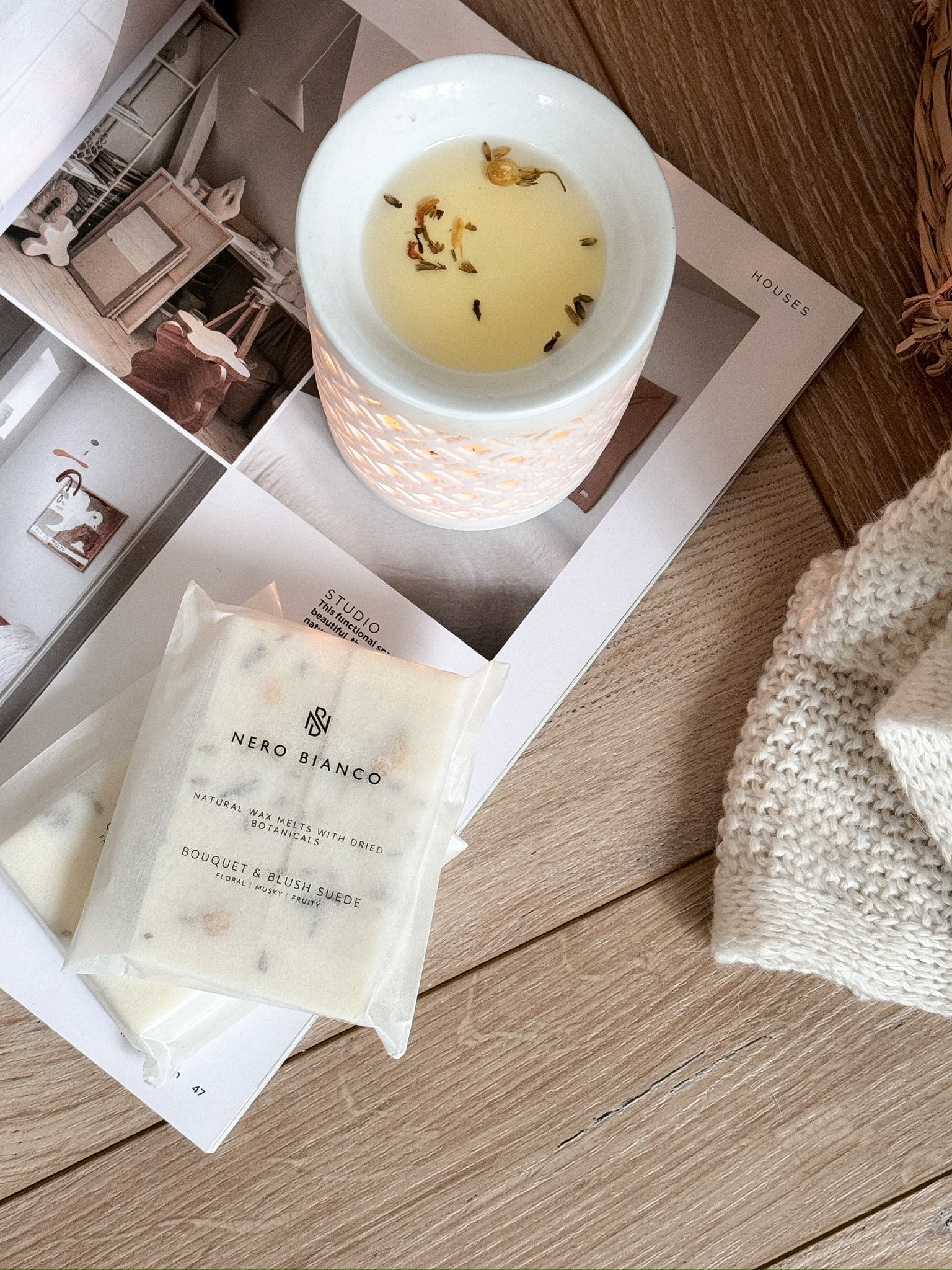 A pack of Nero Bianco wax melts placed on a white surface, with the brand's label visible on the packaging.